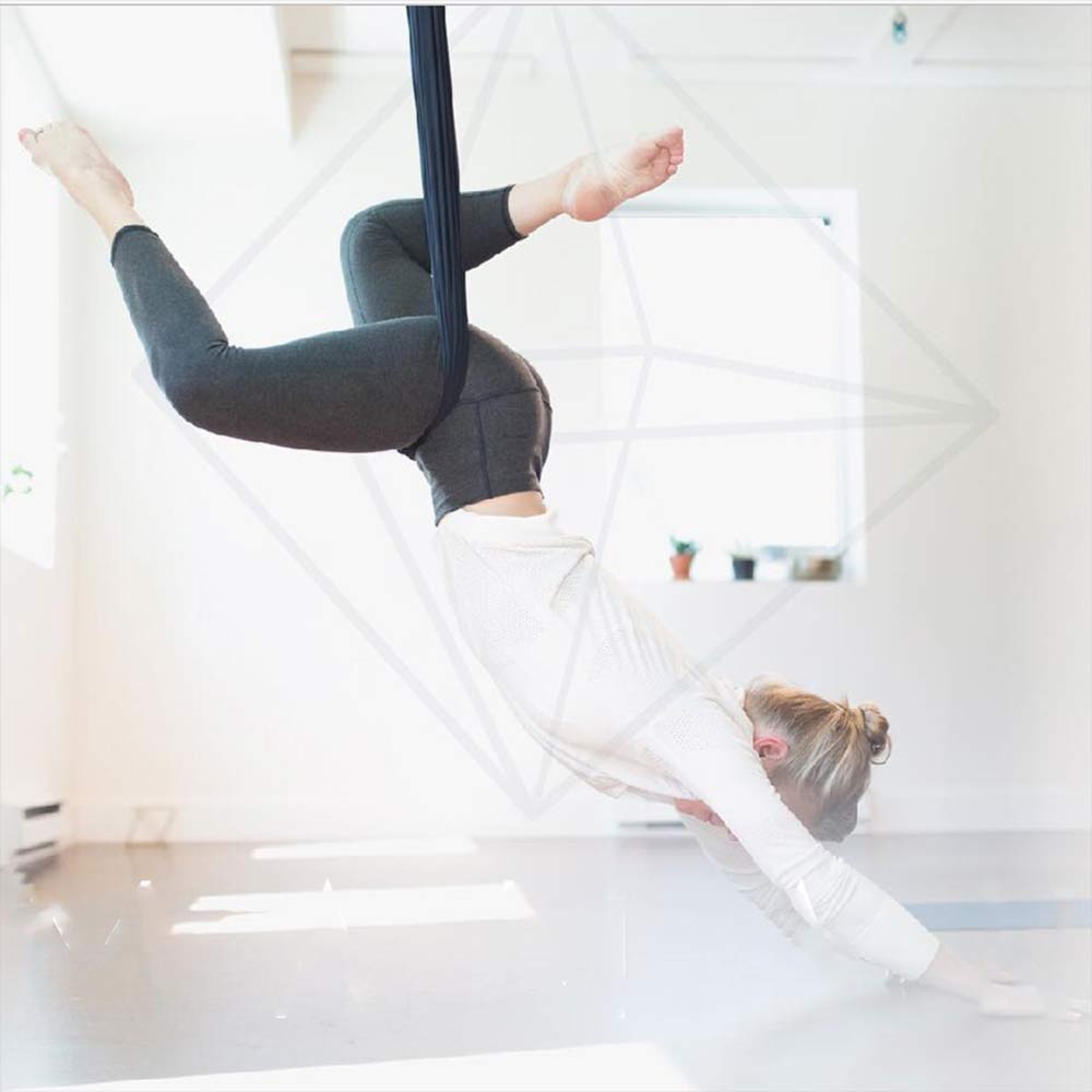 woman doing hip hang variation posture